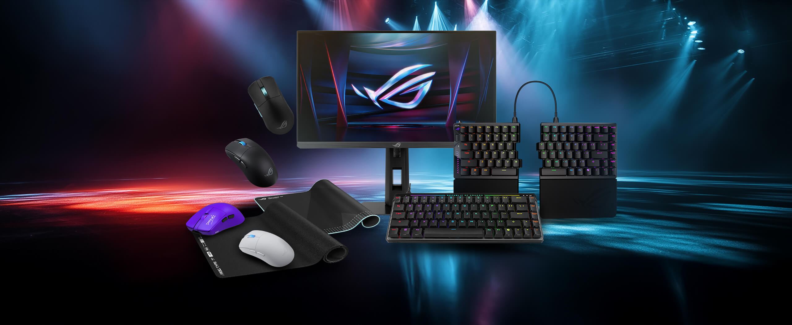 Una imagen que muestra una serie de productos Ace esports, incluidos los cuatro ratones de juego Ace esports, un monitor Ace esports, dos alfombrillas de ratón y dos teclados Ace esports colocados ante un fondo brillante con vibraciones de esports.