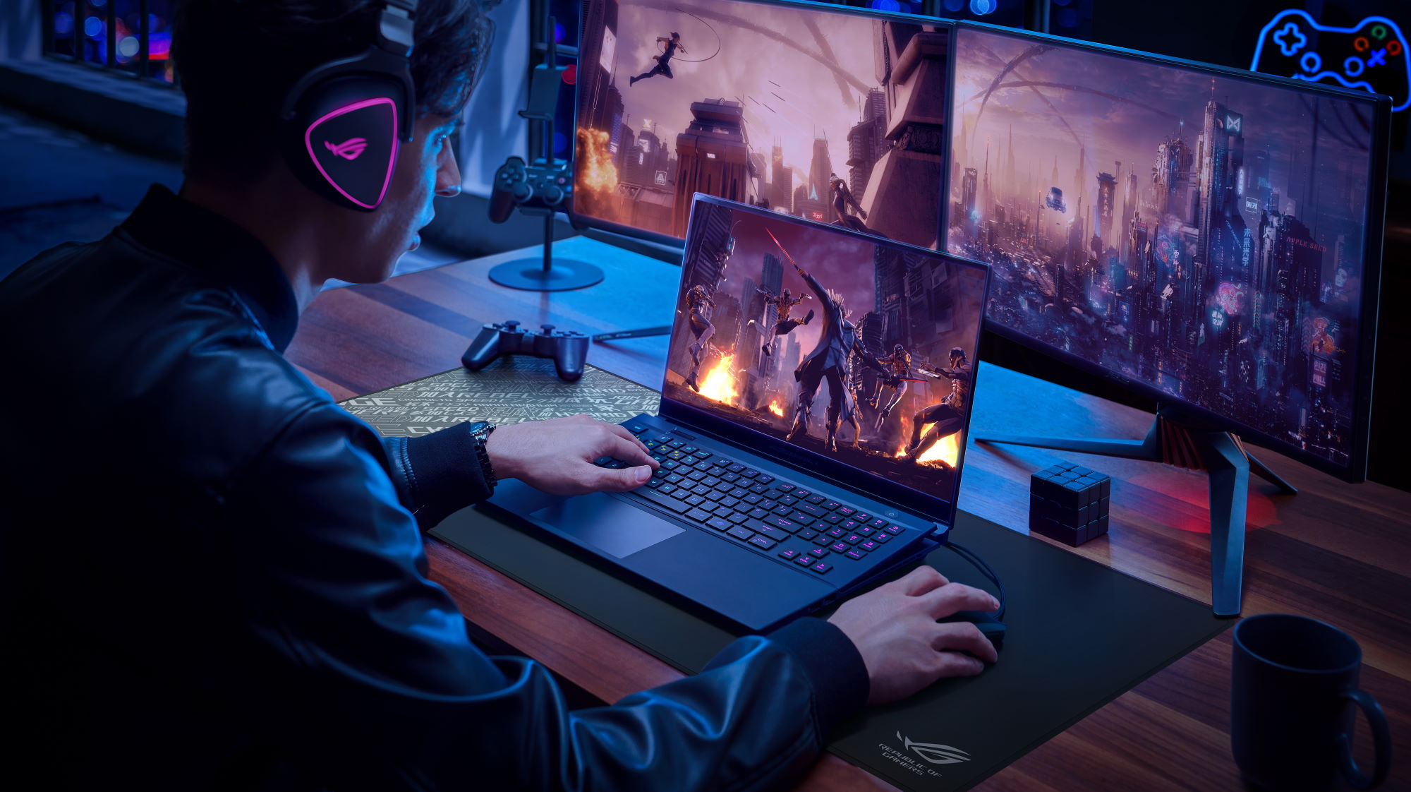 Gamer playing with the S17, wearing a headset and using a wired mouse, with two external monitors on the table.