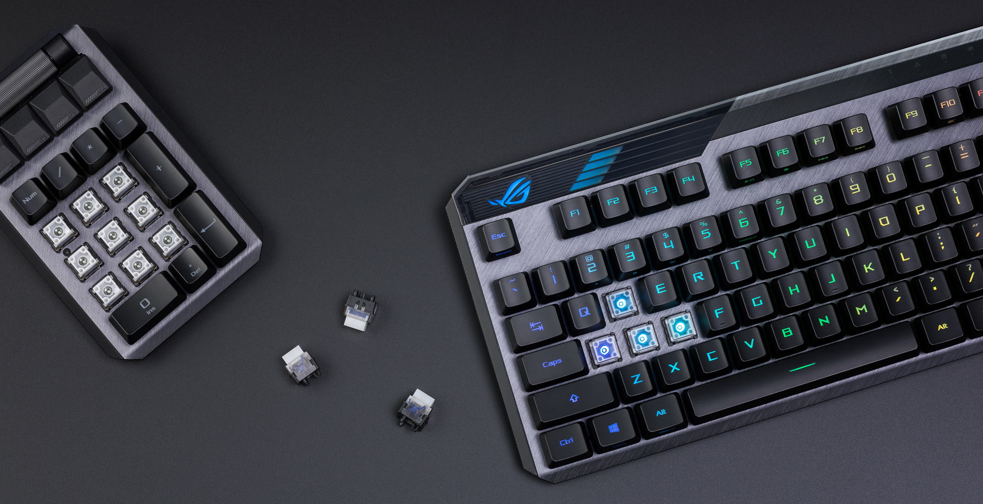 ROG Claymore keyboard, with WASD keys removed, and the number pad next to the keyboard with all number keys removed.