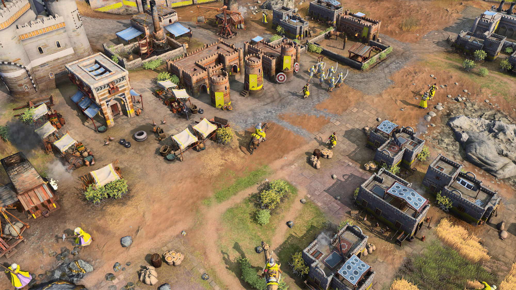 Overhead view of a settlement in Age of Empires IV.
