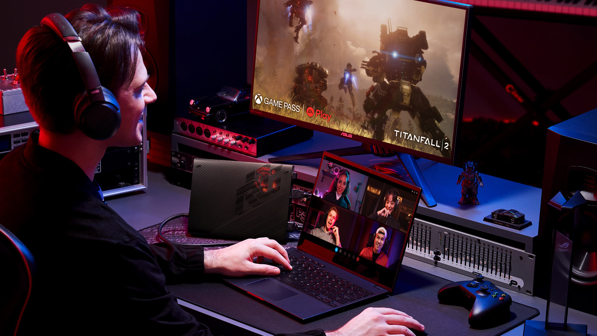 A photo of the Flow X13 laptop hooked up to an external monitor, playing games with an XG Mobile.