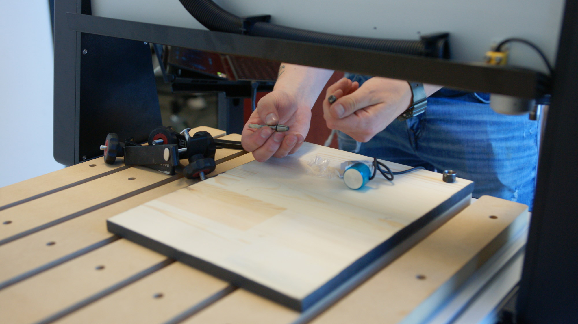 Derek setting up the bits on the i2R CNC machine