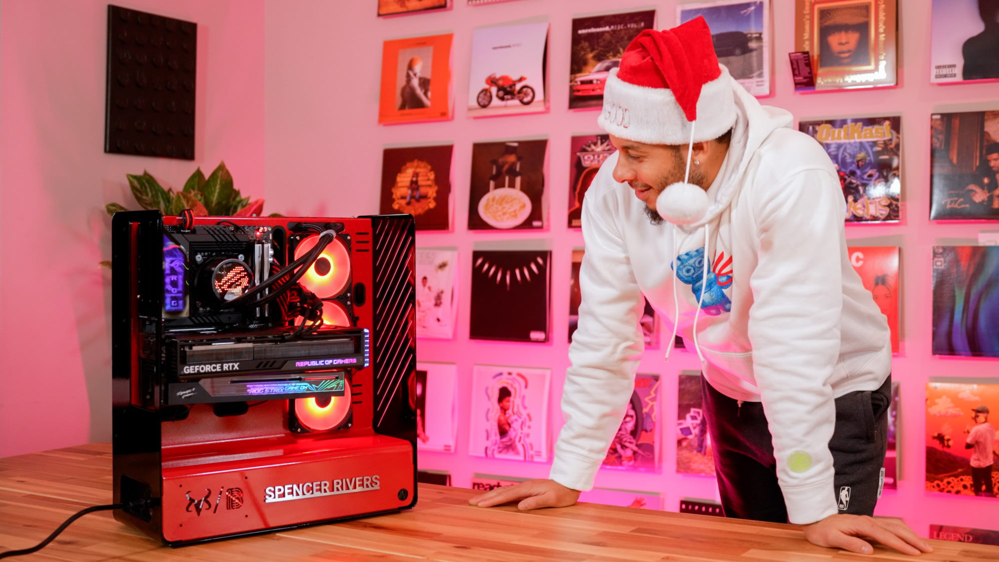 Seth Curry admires the completed gaming PC he made for his brother in law