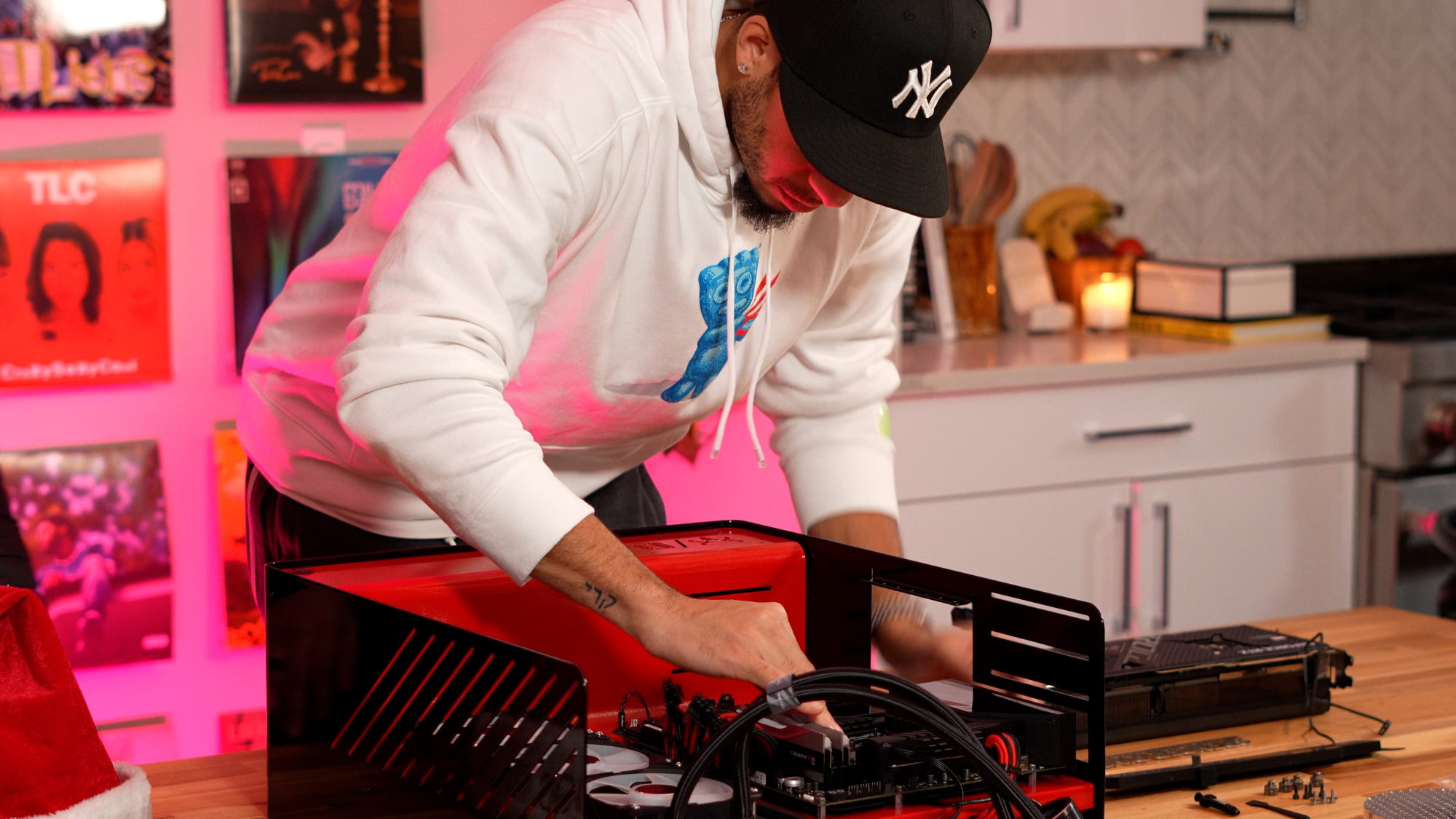 Seth has the case flat on a table as he installs the CPU