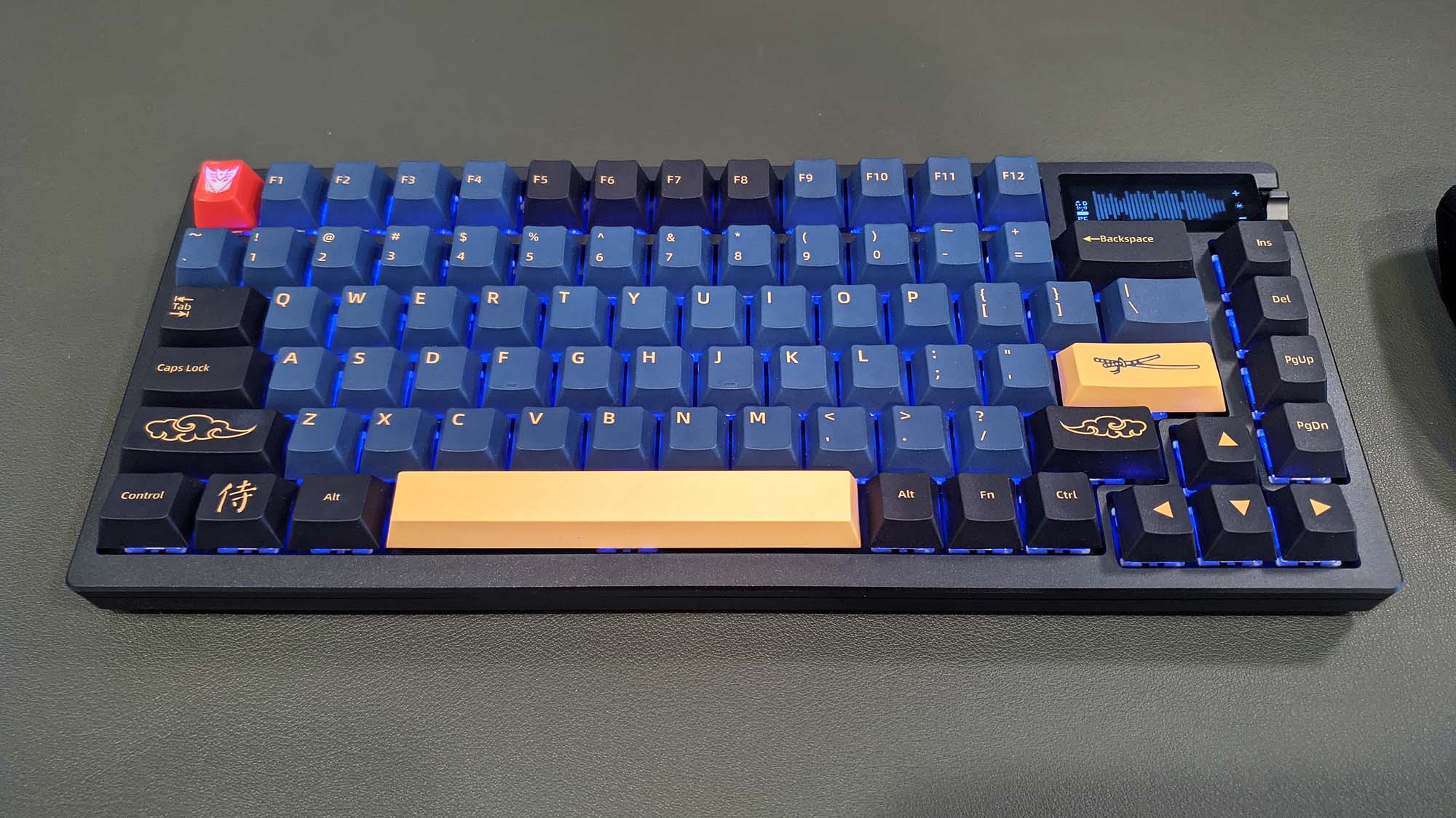 An ROG Azoth customized with custom keycaps and boutique switches