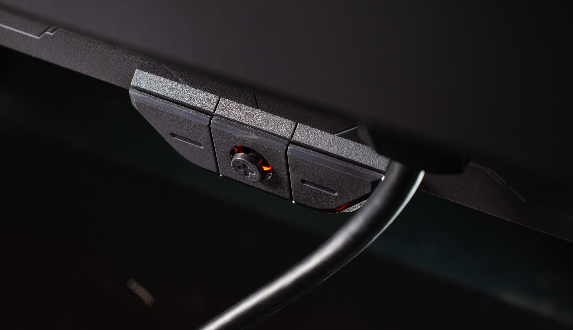 A closeup view of the joystick to allows users to access the on-screen display
