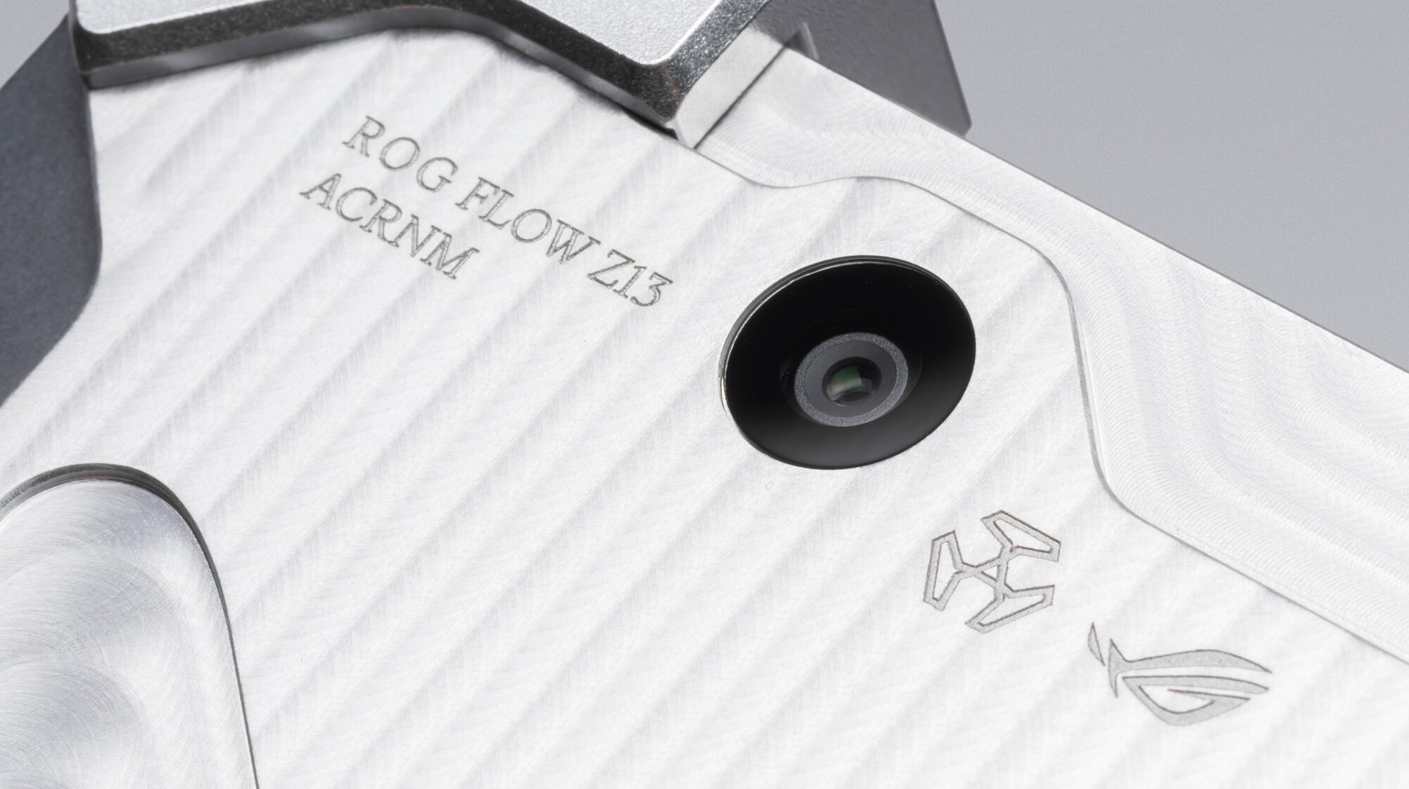 Close up of RMT02 and its rear camera, with ROG and ACRONYM logos visible