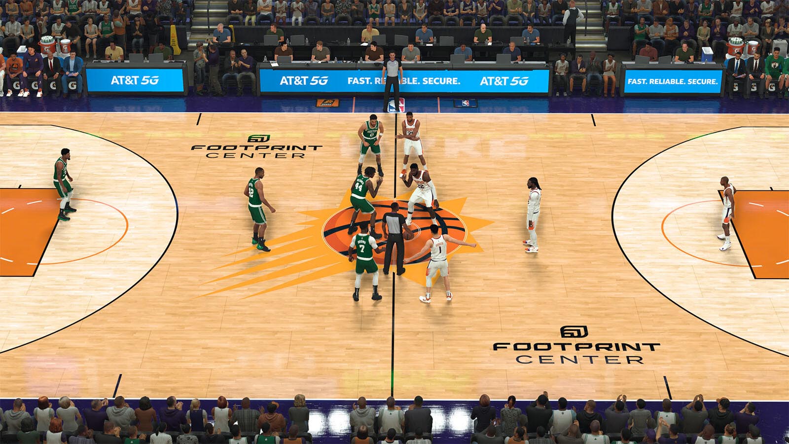 A video game screenshot of a basketball court with two teams in position for tip-off.