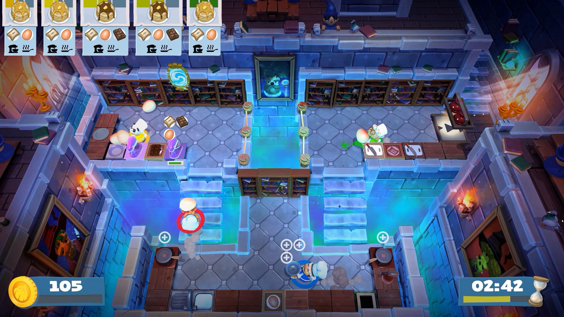 A video game screenshot of four chefs cooking various items in a large kitchen.