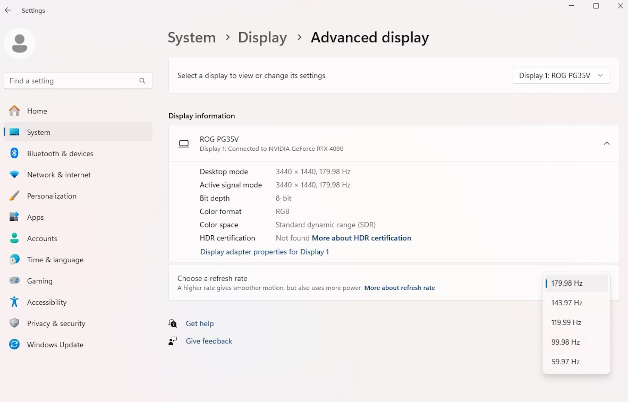 Windows 11's Advanced Display settings, with the Refresh Rate dropdown open.