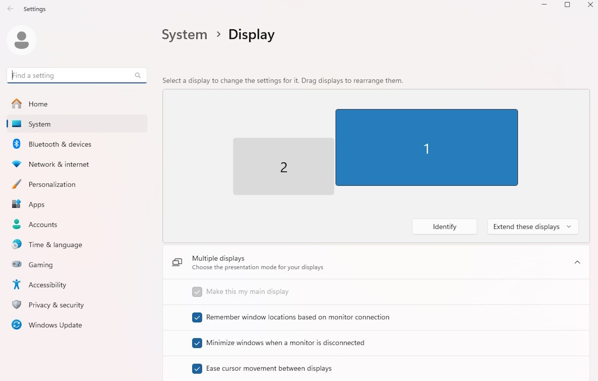 Windows 11's display settings, with two monitors visible.