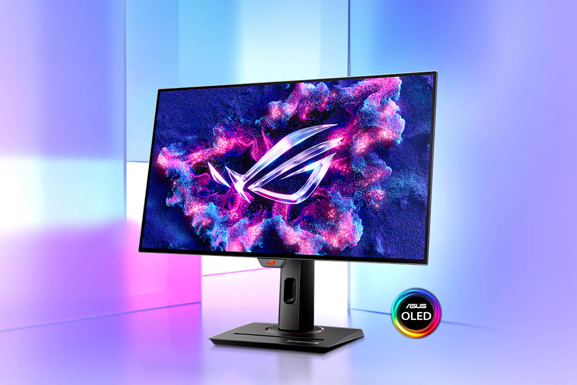 The ROG Strix OLED XG27AQDMG gaming monitor against a blue background
