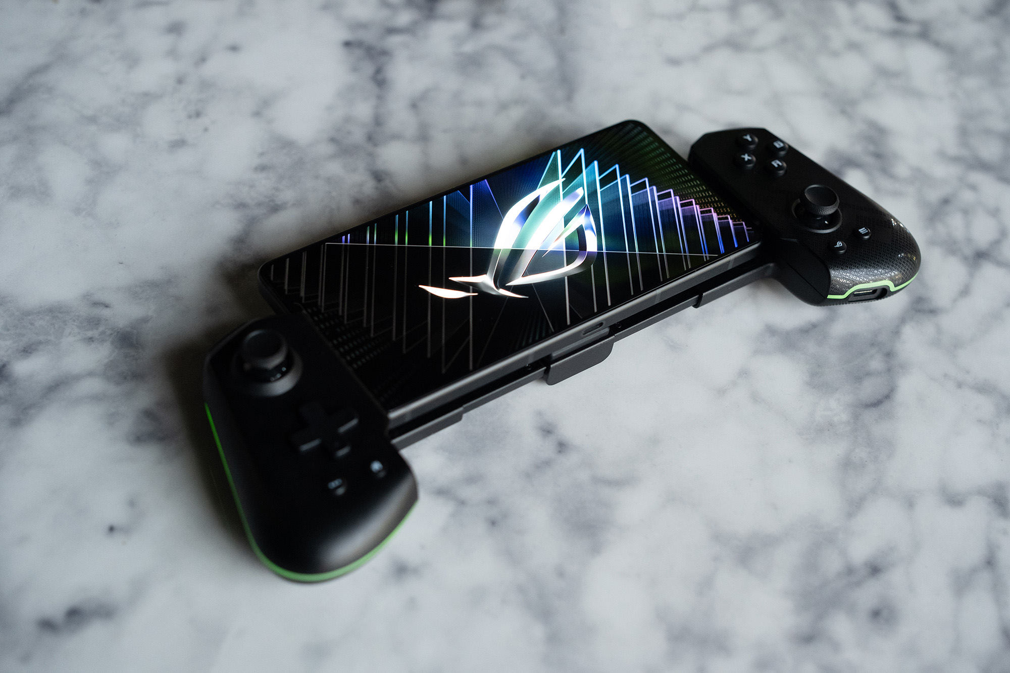 The ROG Tessen on top of a marble surface