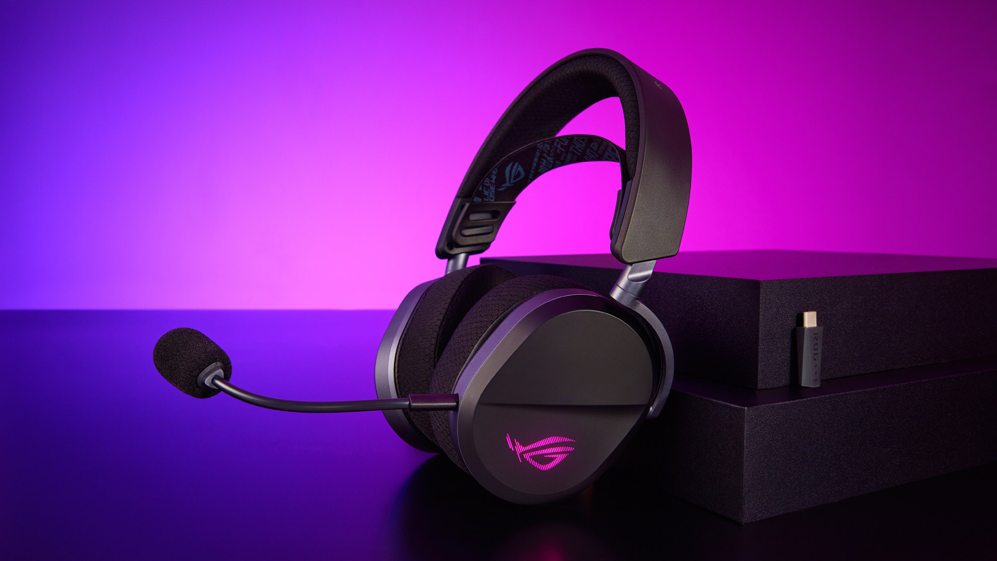 The ROG Pelta Headset on a purple background.