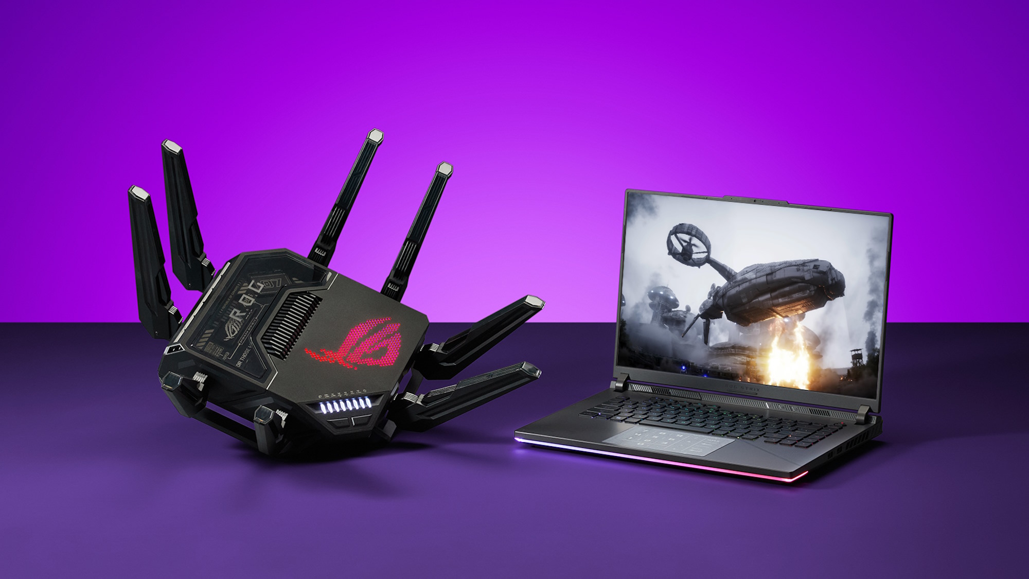 The ROG Rapture GT-BE98 Pro wireless router with an ROG laptop on a table