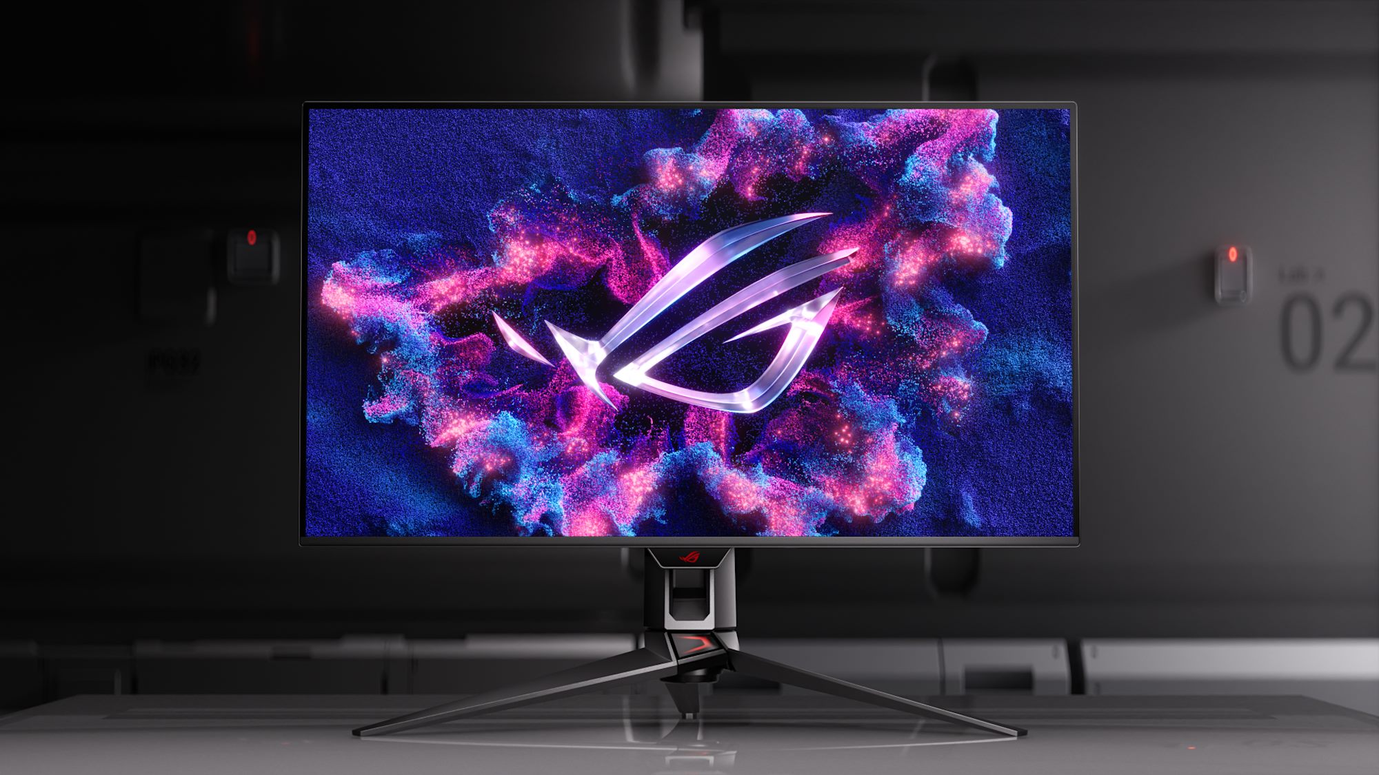 Ein ROG Swift OLED PG32ucdm auf einem grauen Schreibtisch