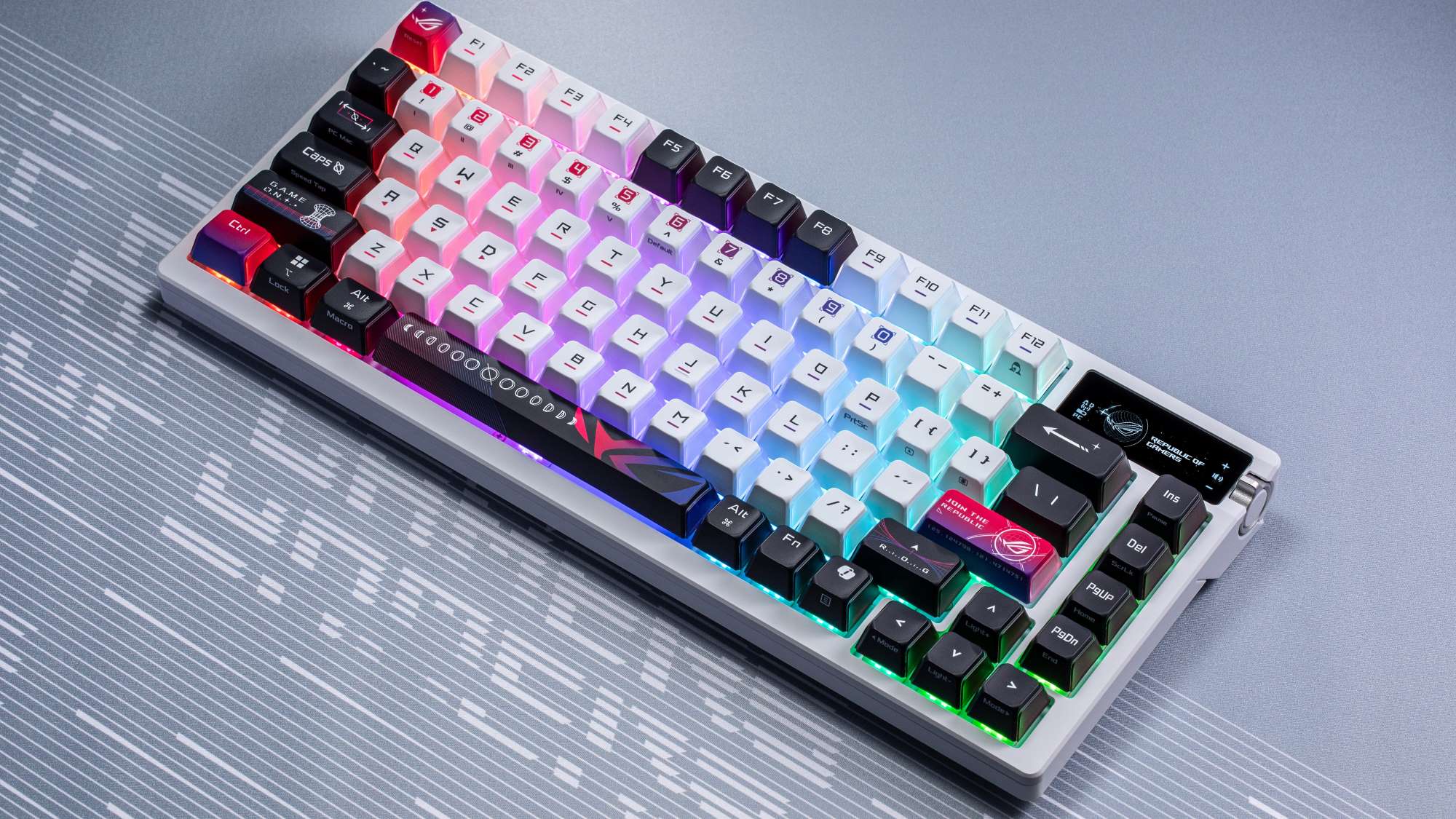 The Moonlight White ROG Azoth X keyboard resting on a gray surface.