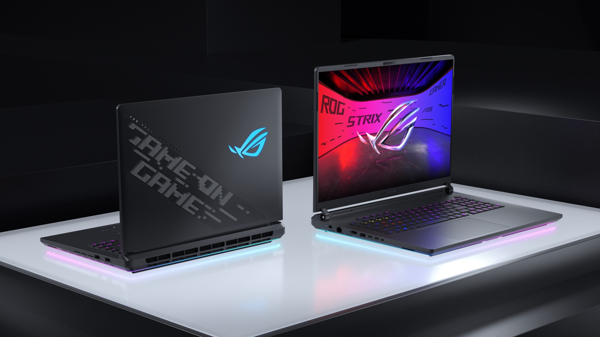The ROG Strix SCAR on a table with the ROG logo visible on screen