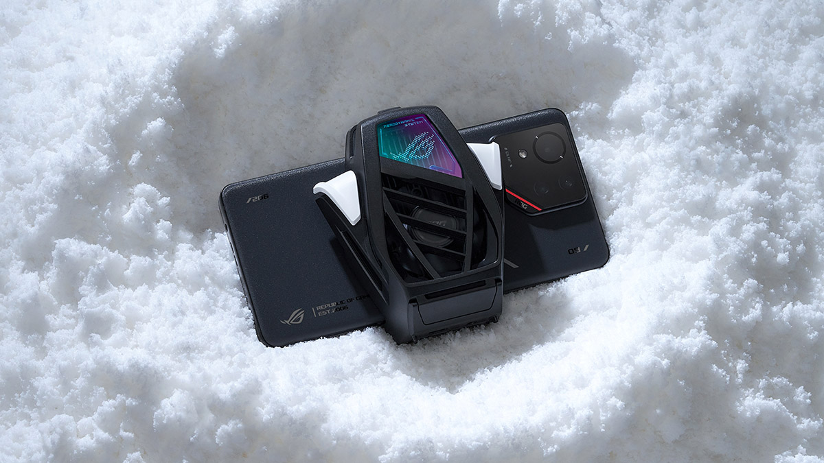 The ROG Phone 9 with AeroActive Cooler X Pro resting on snow