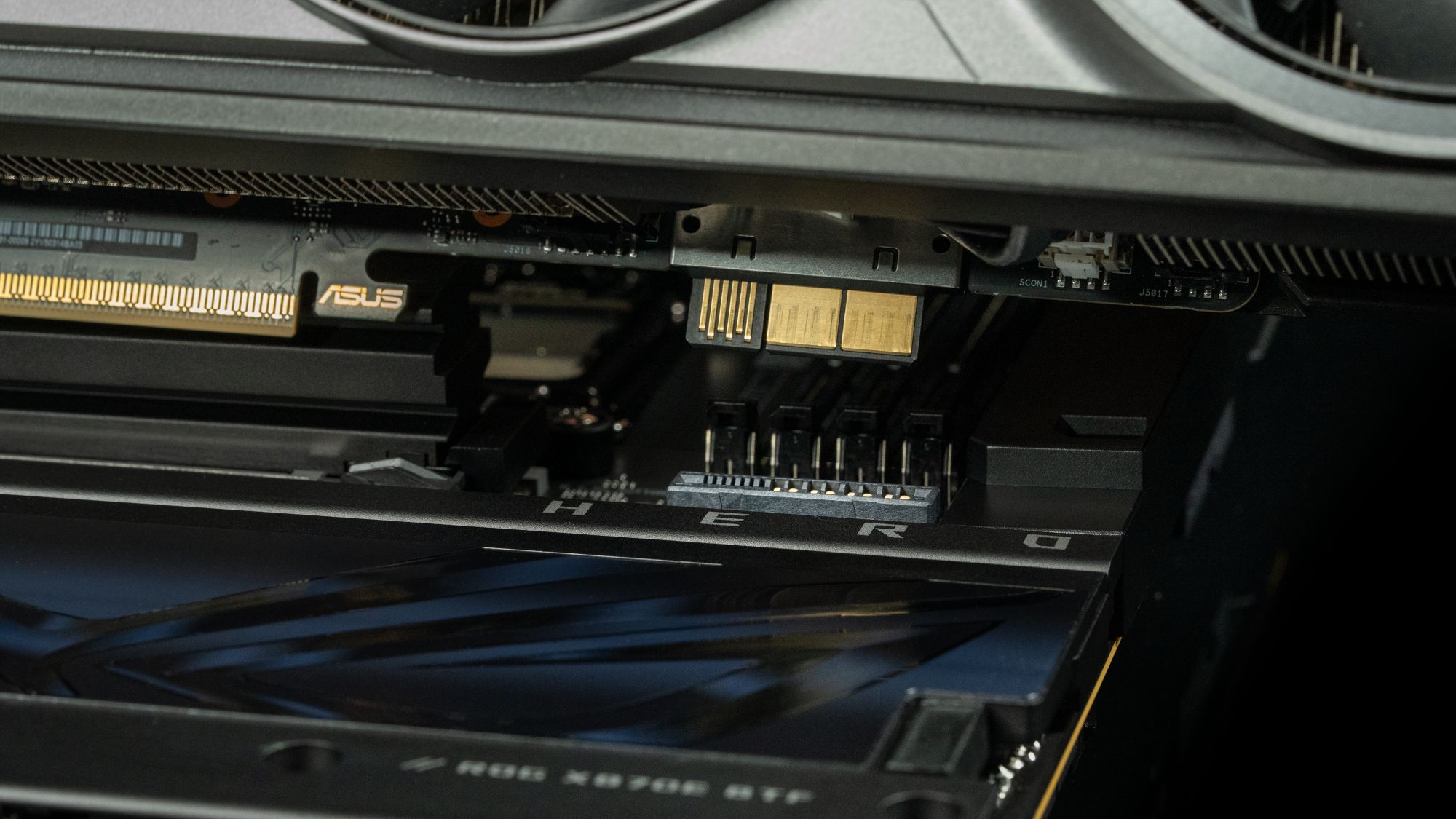 A closeup shot of the ROG Crosshair X870E Hero BTF motherboard's surface.