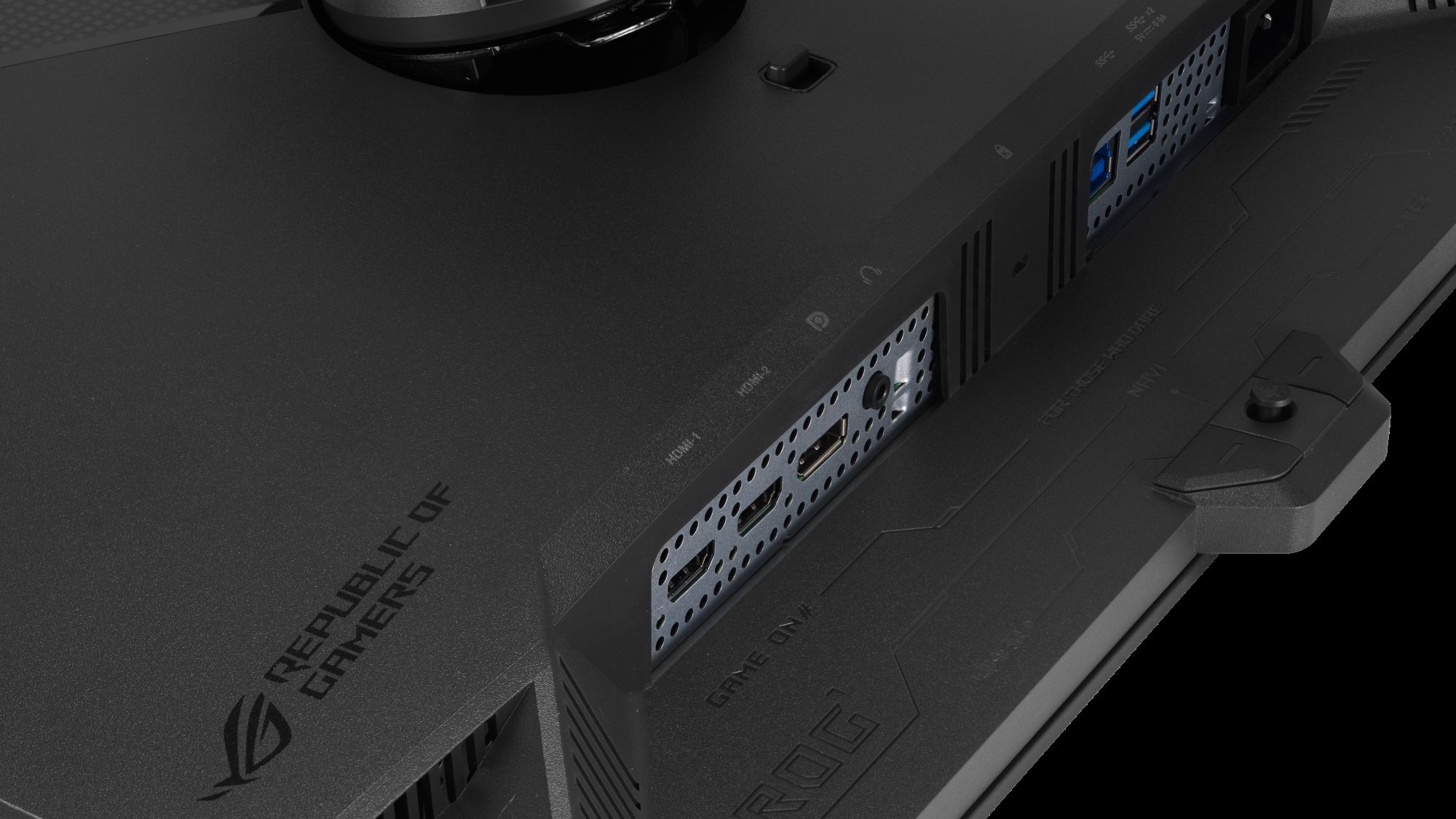 A closeup shot of the ROG Strix OLED XG27AQWMG's assortment of ports and connectivity points.